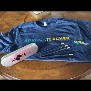 “Advocate Teacher” shirt from Moore College of Art and Design with pencils/case